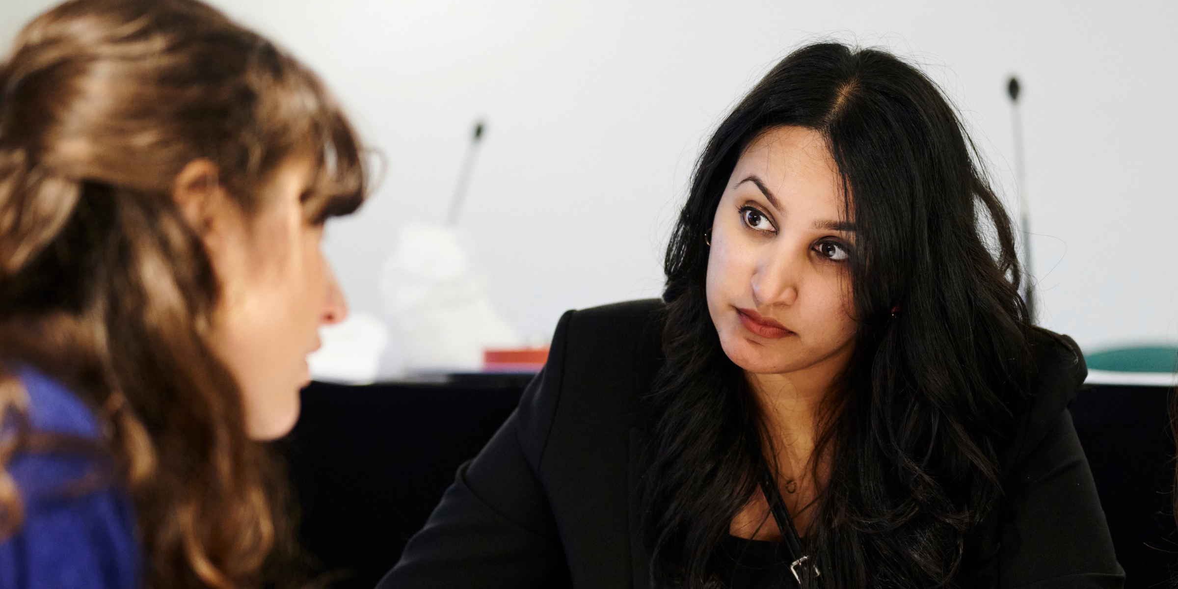 Two women talking to each other