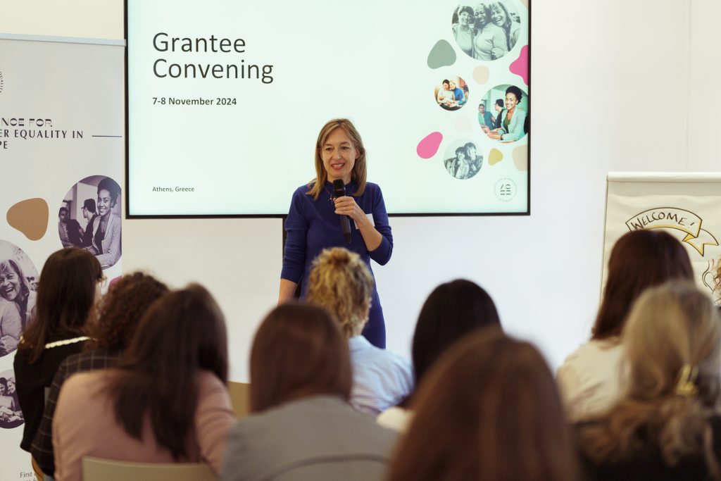 Woman giving a speech a the AGE event
